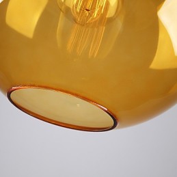 Lámpara colgante moderna de cristal con pantalla de cristal redonda con diseño de burbujas de color ámbar.