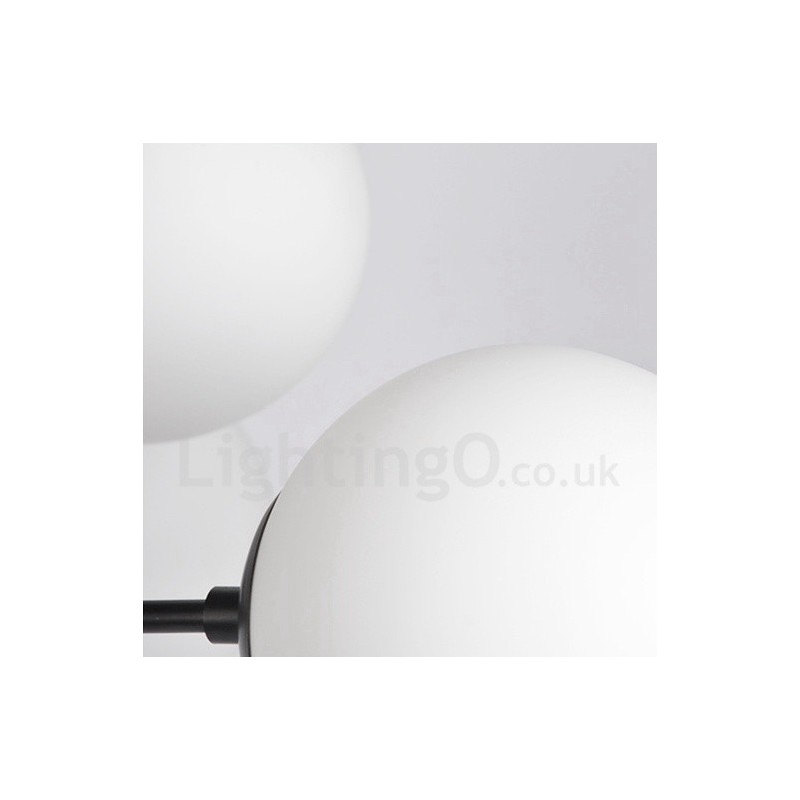 Lámpara de araña de metal negra de 12 luces y 2 niveles con pantalla de cristal, estilo moderno y contemporáneo.