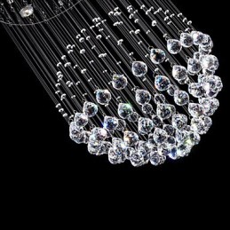 Lámpara colgante moderna de cristal de 5 luces con dosel plateado y globo de cristal transparente.
