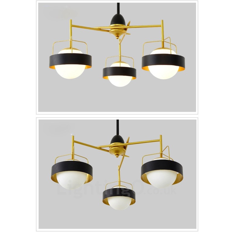 Lámpara de techo moderna contemporánea de 3 luces con baño de cobre y pantalla de cristal esférico blanco y negro.