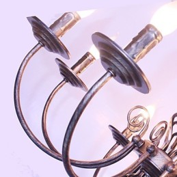 Lámpara de araña de metal estilo vela de diseñadores retro.