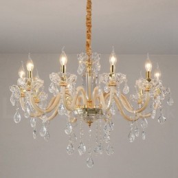 Candelabro dorado con candelabro de cristal transparente