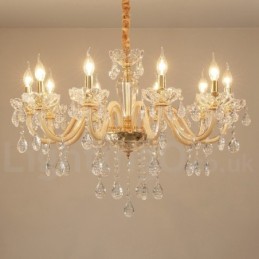 Candelabro dorado con candelabro de cristal transparente