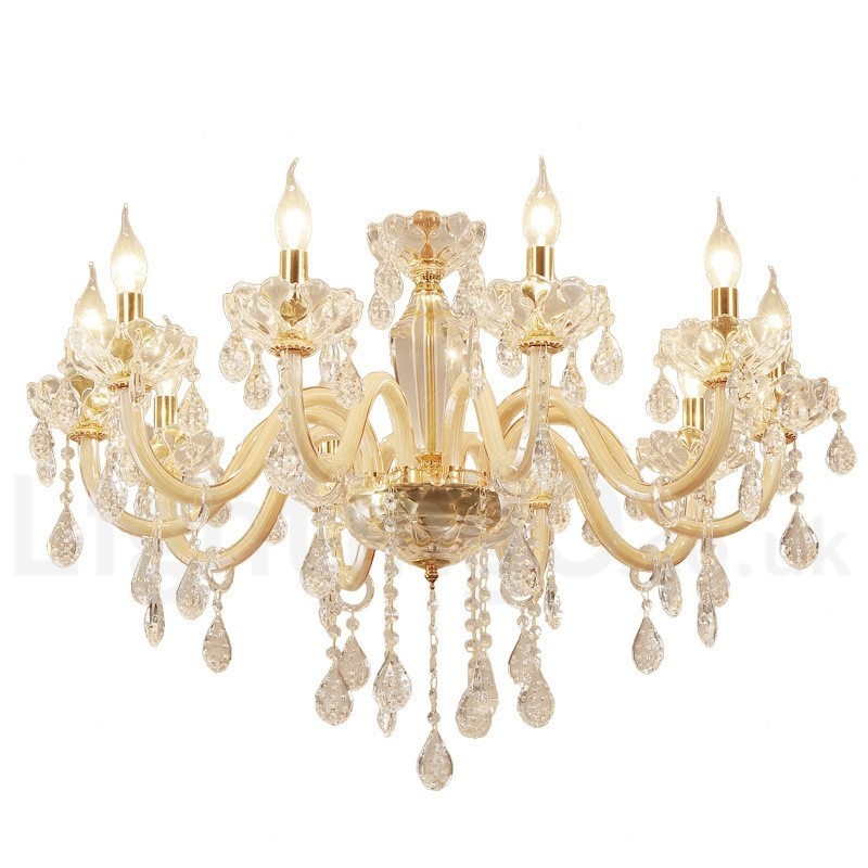 Candelabro dorado con candelabro de cristal transparente