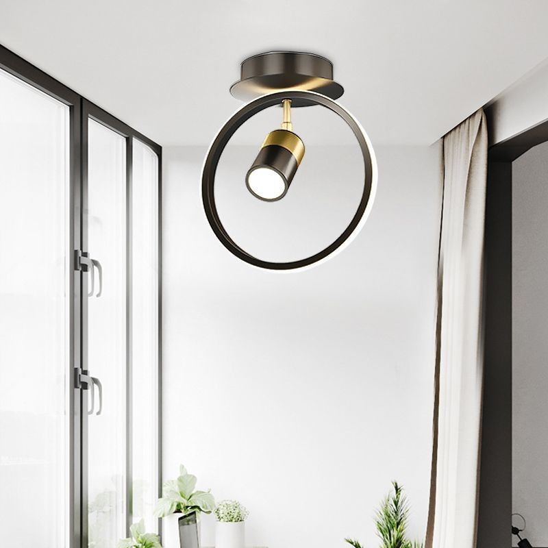 Lámpara de techo acrílica minimalista con foco decorativo.