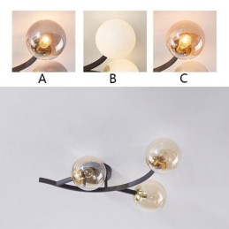 Lámpara de techo moderna minimalista con forma de rama y globo de cristal