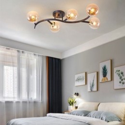 Lámpara de techo moderna minimalista con forma de rama y globo de cristal