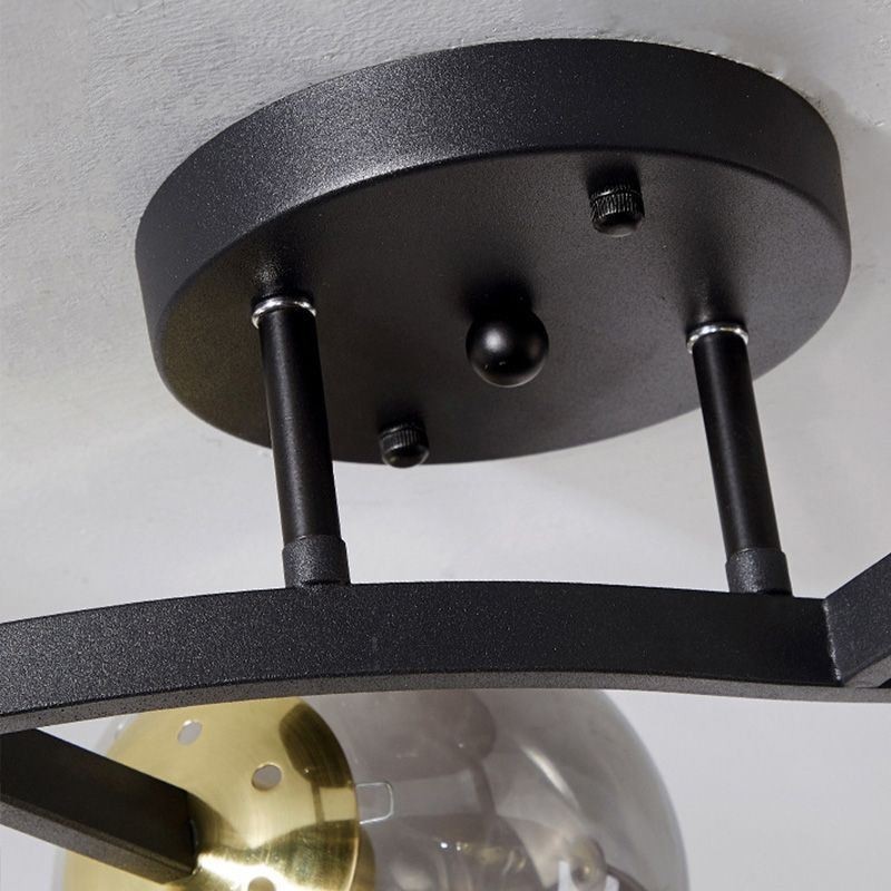 Lámpara de techo moderna minimalista con forma de rama y globo de cristal
