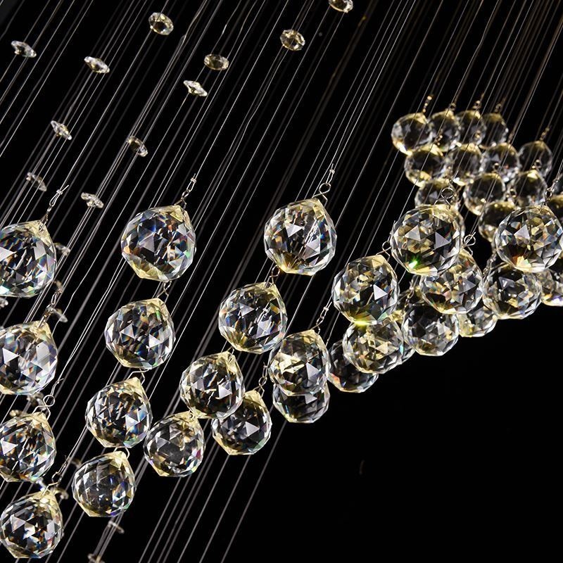 Elegante lámpara de araña de cristal con forma de gota de lluvia para el techo del vestíbulo