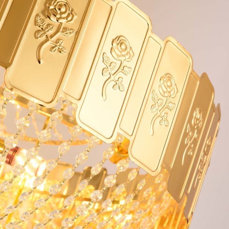 Lámpara colgante de cristal dorado, elegante y decorativa.