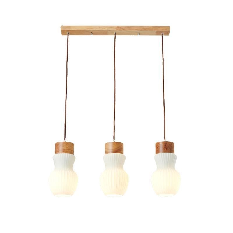 Lámpara colgante de cristal japonesa con decoración creativa.