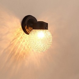 Aplique de pared moderno contemporáneo con acabado en óxido negro, ideal para apliques de pared con luz ambiental de estilo mini.