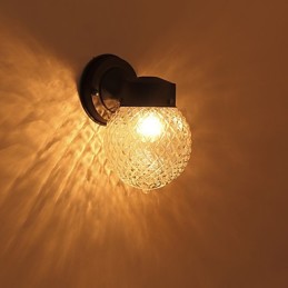 Aplique de pared moderno contemporáneo con acabado en óxido negro, ideal para apliques de pared con luz ambiental de estilo mini.