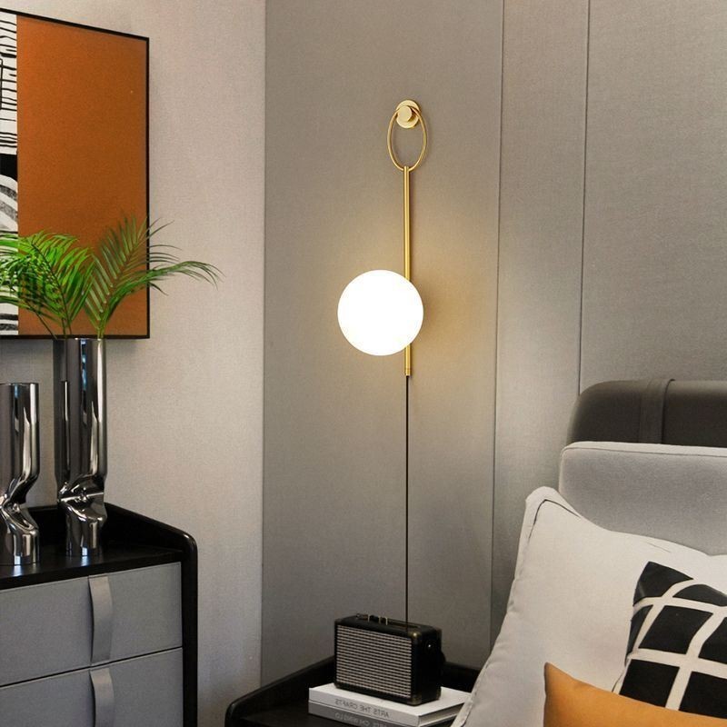 Aplique de pared moderno con forma de globo y cristal dorado cepillado